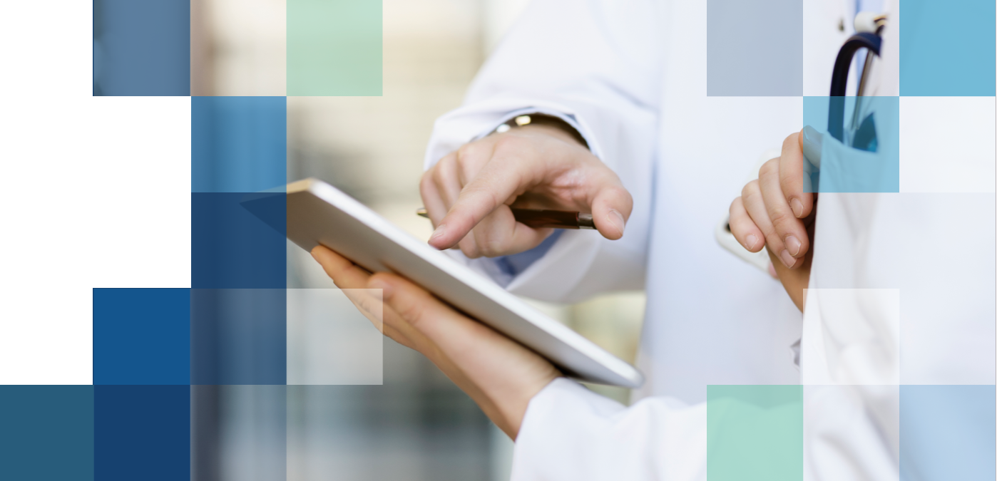 Two eye care professionals discussing the treatment plan for a patient on a tablet.